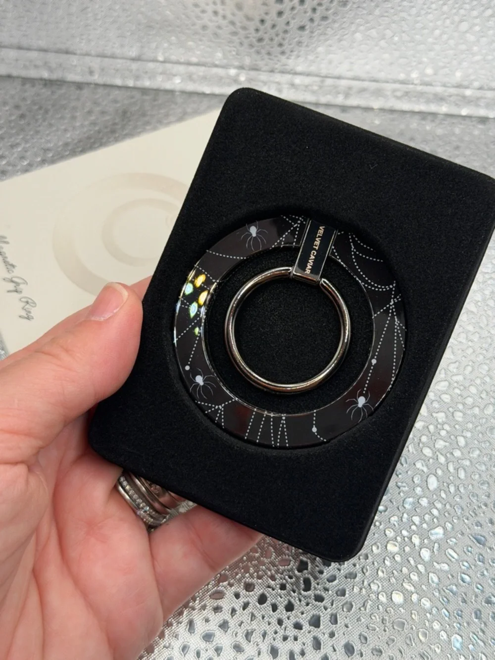 Velvet Caviar Round Spider Web 'In Your Web' MagSafe Grip Phone Ring Holder